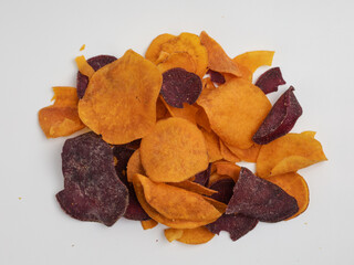 Sweet potato chips on white background