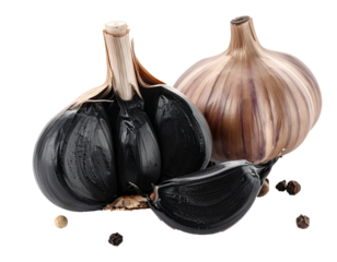 Black Garlic Bulbs and Cloves Isolated on White Background