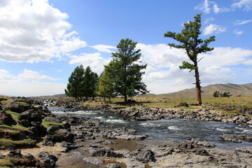 The Orkhon Waterfall is located in Mongolia. A small lake has formed where the waterfall, the...