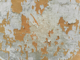 Severy wear, tear and chipping on old building's brick wall