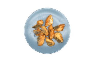 Sea bass cut into pieces and fried to eat with rice.