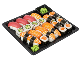 Assortment of freshly made sushi and rolls artfully arranged in a black tray transparent background