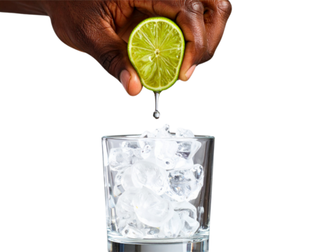 Barman Hand Squeezing Lime Over Glass with Crushed Ice, Caipirinha Preparation