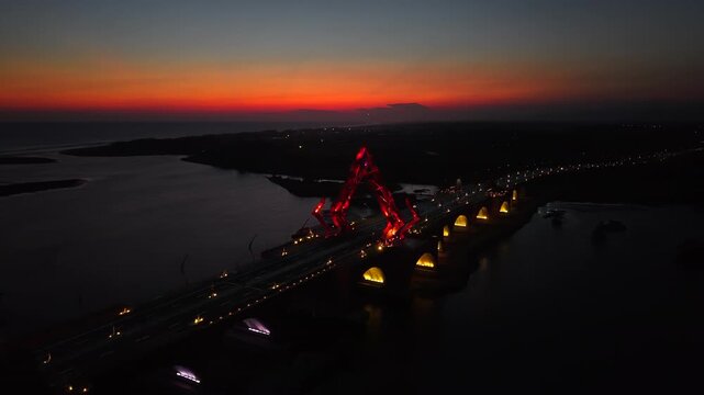 Aerial view of the Pandansimo Bridge at sunset, Bantul, Yogyakarta, as part of the southern ring road route of Java.