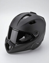 Close-up shot of a matte black motorcycle helmet with a dark visor, showcasing its design.