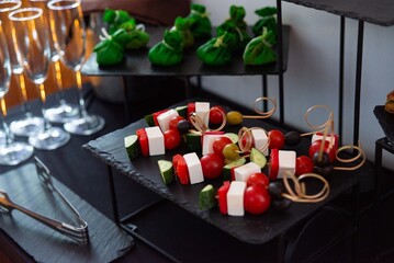 Elegant appetizers with cheese and vegetables