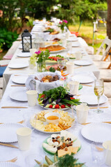 Elegant outdoor garden dining setup