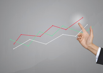 Business hand touching growth graphs of financial indicator and accounting market economy analysis chart, business strategy concept.