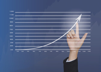 Business hand touching growth graphs of financial indicator and accounting market economy analysis chart, business strategy concept.