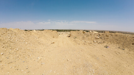 Desert Landscape with Dirt Mounds