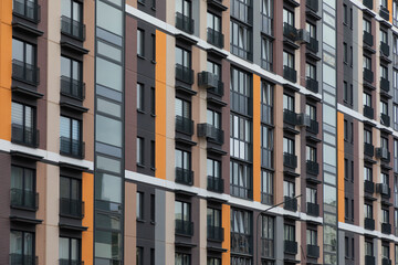 Modern high-rise apartment buildings in a vibrant residential area showcasing diverse living options and urban architecture