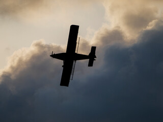 plane silhouette in the sky