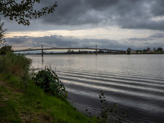 Bridge on the Ebro river in the Ebro Delta. Concrete bridge. Way on the river