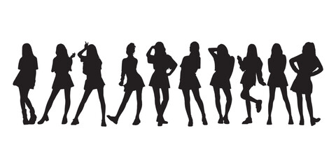 Silhouette of a Group of Fashionable Women Standing in Stylish Poses