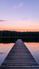 Obraz premium Wooden Pier on Calm Lake at Sunset