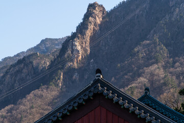 idyllic landscape with the traditional Korean roof and cable car in the mountain view