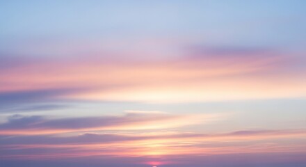Obraz premium Pastel Sunset Sky with Delicate Cloud Formations and Soft Light