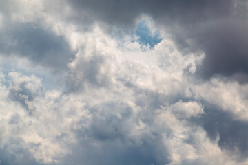 White cloud texture against gray clouds high in the sky, close-up inside the cloud