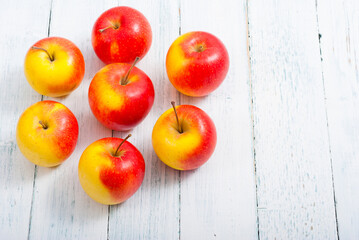 apple fruits on old white wooden table