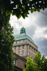 Dome of the University of Zurich framed by trees