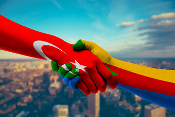 Shaking hands Turkey and Comoros