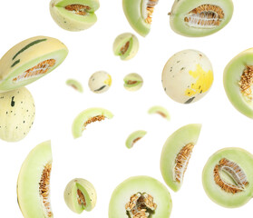 Tasty ripe melons swirling in air against white background