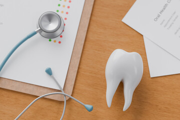 Top view of dentist table with whit tooh, dental check list paper on clipboard, dental check up.