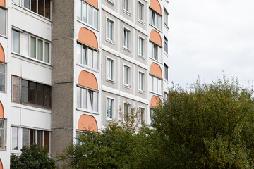High-rise apartment buildings in a residential area illustrating the challenges of rent, mortgage,...