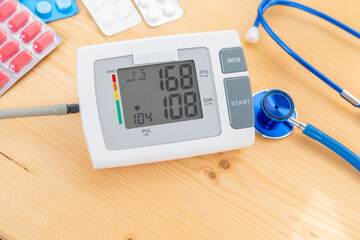 Digital device measuring blood pressure and pulse, ideal for personal health and hypertension...