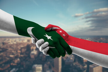 Shaking hands Pakistan and_Singapore