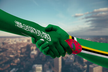 Shaking hands Saudi Arabia and Dominica
