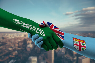 Shaking hands Saudi Arabia and Fiji