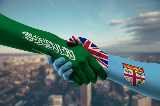 Shaking hands Saudi Arabia and Fiji - Powered by Adobe