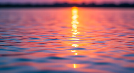 Serene aquatic surface bathed in the glow of the fading sunlight creating a surreal and dreamlike atmosphere with soft