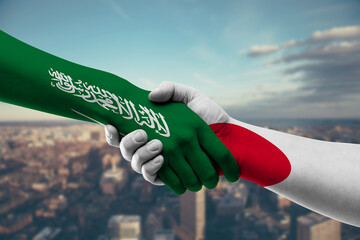 Shaking hands Saudi Arabia and Japan