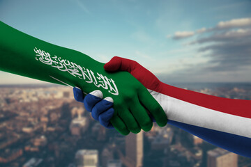 Shaking hands Saudi Arabia and Netherlands