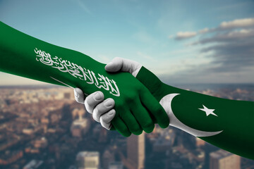 Shaking hands Saudi Arabia and Pakistan