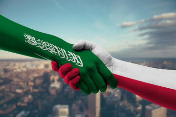 Shaking hands Saudi Arabia and Poland