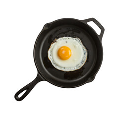 Single fried egg in a seasoned cast iron skillet.  Breakfast, cooking, food photography.
