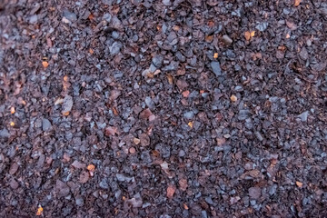 Pile of black rocks and dirt