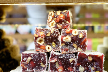 Stack of food with nuts on top