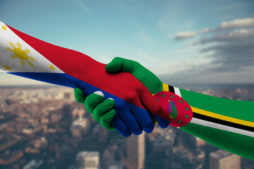 Shaking hands Philippines and_Dominica