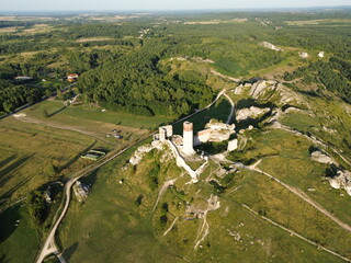 Golden hour drone flight over Olsztyn Castle, Poland