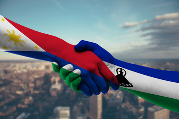 Shaking hands Philippines and_Lesotho