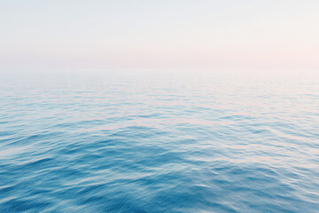 capture aerial view of tranquil ocean waves at sunset highlighting interplay of colors