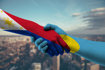 Shaking hands Philippines and_Palau
