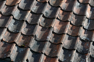Background texture of old terracotta clay roof tiles