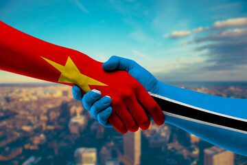 Shaking hands Vietnam and Botswana