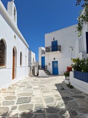 Naklejka premium White houses and blue doors in Lefkes on Paros, Greece