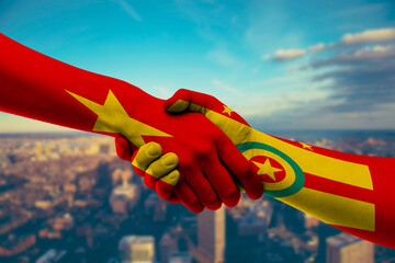 Shaking hands Vietnam and Grenada